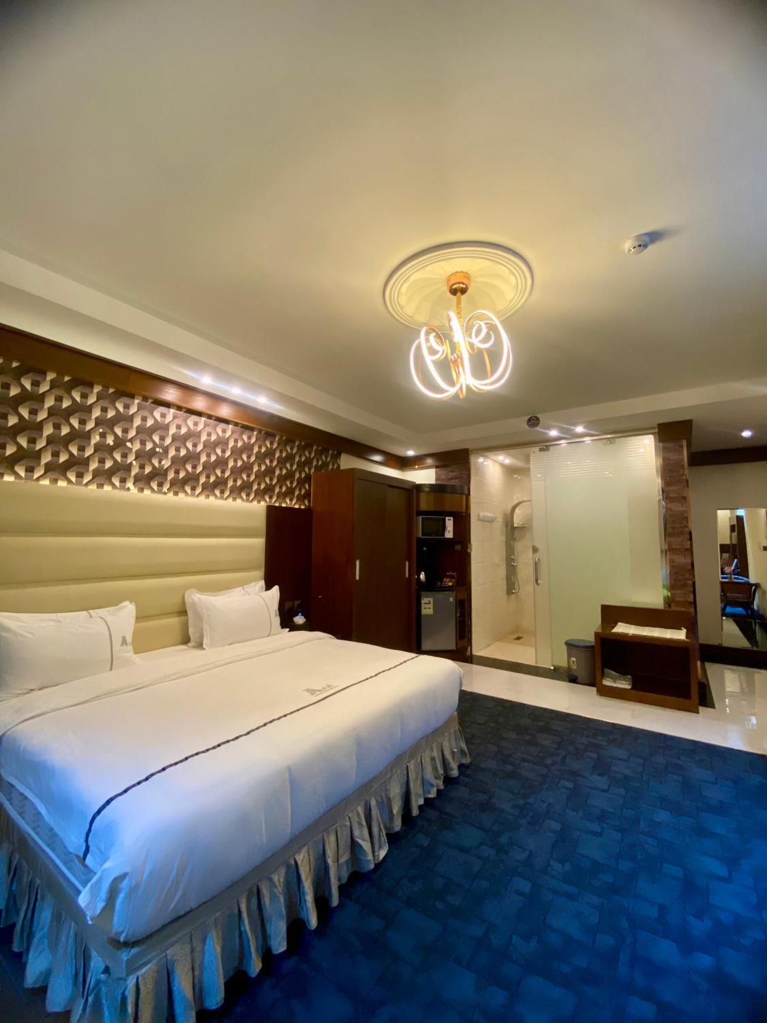 Aral Hotel Apartments Tabuk Extérieur photo