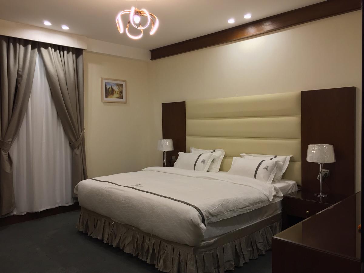 Aral Hotel Apartments Tabuk Extérieur photo